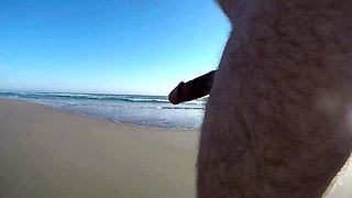 Nude amateur guy exposes his thick meat pole on the beach