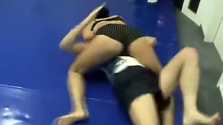 Mixed wrestling - strong woman scissors