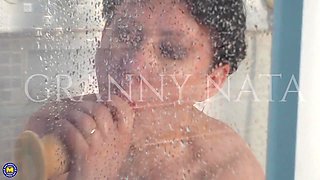 Modern Grandma Nata Loves To Play With Her Dildo And Her Pussy In The Bathroom