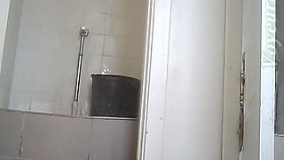Brunette young stranger girl squats and pisses in the toilet