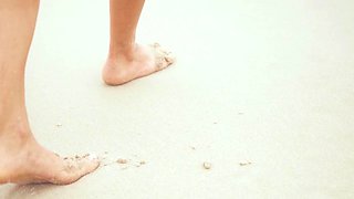 Petite Australian MILF strips at a beach