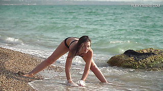 Hot acrobatics at the sea with Kim Nadara