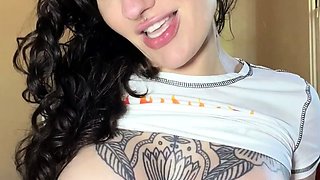 Busty curly brunette with big boobs fucks on couch