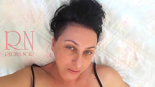 White socks. Cute chick lies on the bed, smiles, gracefully bends. Footfetish. Foot fetish.