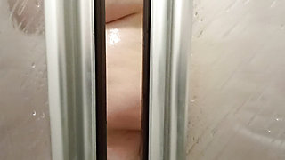 Forbidden look through the crack in the door, I see her showering naked