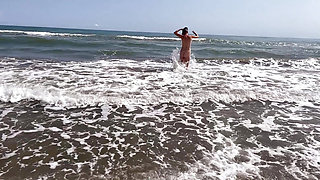 Dominant woman having fun on the beach