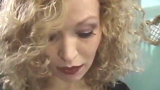Slave Girl In Red Lingerie Servicing Dominatrix