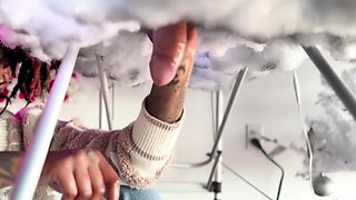 Pierced and tattooed boy sucking black cock from glory hole