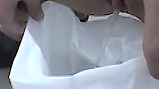 Teen pissing in bathroom