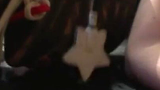 Humiliates and puts flowers in pussy