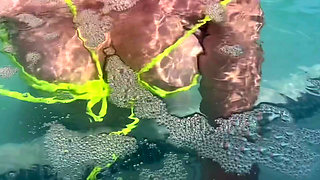 Artemisia Love flashing her juicy big tits underwater for you wearing a sexy bikini
