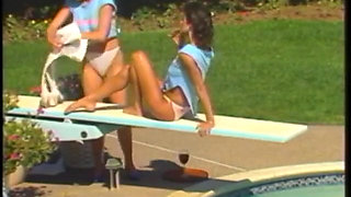 Sexy brunette babe rides her friend's huge strap-on with her tight twat