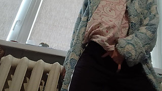 A Slender Brunette in a Robe Masturbates at Home After University