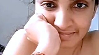 Horny busty indian milf strips nude on webcam show