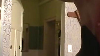 Blonde MILF humiliates masked pig