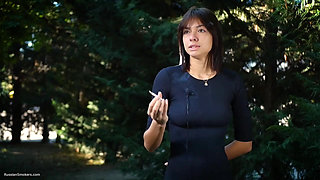 Sweet Russian Beauty Smoking Cigarette in Nature