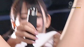 She masturbates by inserting and removing her fingers and using a vibrator, squirting.