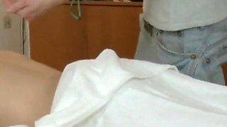 Horny teen gets oiled and banged on massage table