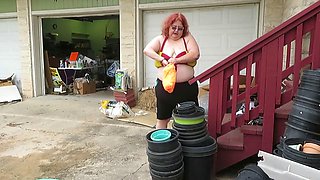 Hot Mature BBW Redhead Nurse Vicki Washes Her Car!