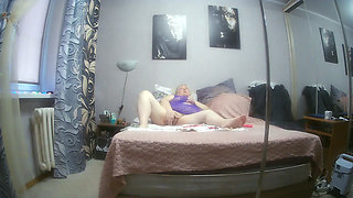 I'm watching my mother-in-law playing with her big cunt