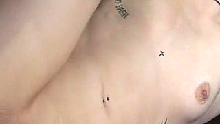 Tattooed Brunette Gets Fingered on the Couch and Cums Hard