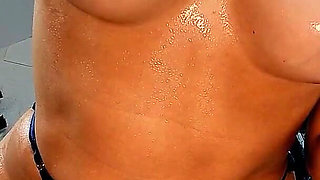 Oiled Babe Teases in Her Crotchless Panties