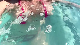 Artemisia Love Sexy and Horny Underwater Showing Her Big Tits in a Super Micro Bikini and You Can See Her Aureolas…