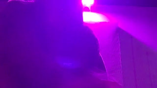 Smoking a Cigarette Outdoor While Wearing Only a Bikini and a Jacket