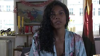 Sexy black-haired honey jerks outdoors