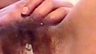 Beautiful Stepmother Smoking Through Her Big Hairy Pussy, She Smiles and Inserts Her Fingers