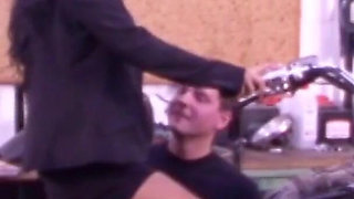 German bike bride is fucked by a mechanic trainee in the workshop