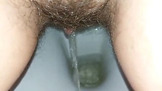 Hairy Russian MILF GinnaGg Pisses and Wipes Her Wet Pussy - Amateur Homemade Solo