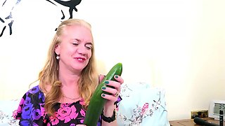 Horny Mature Blonde Fucks Her Pussy with Big Cucumber and Vibrator