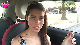 Cute teen Petra smoking in the car