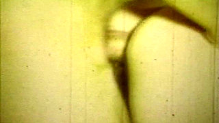 Worn Sepia Loop Captures Curly Retro Couple in Raw Bedroom Passion