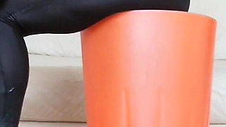 Raven Toe Tapping Crossed Legs with Hight Hells and Latex Pants