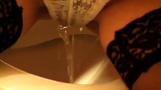 Toilet Pissing Through Lace