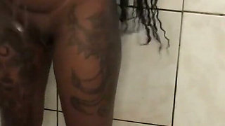 Ebony pearl pissing in shower