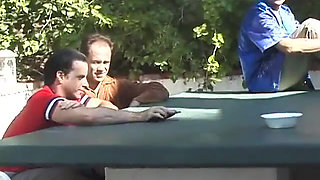 Horny black haired beauty sucks and fucks four men by the pool