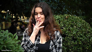 Sweet and Busty Russian Babe Smoking Cigarette in Nature