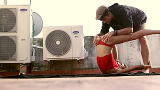 Woman in Red at the Rooftop