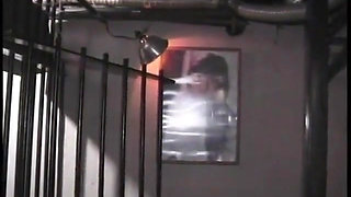 Mature mistress chastises and punishes alluring blonde female parent in BDSM chamber
