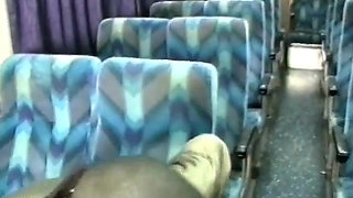 Black stud gets his huge cock sucked by ebony slut on the back seat of a bus
