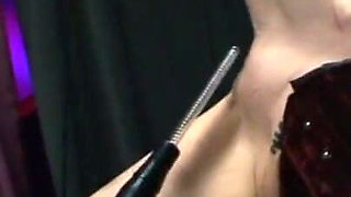 Dominating wax and dildo play