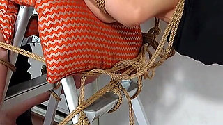 A Woman's Nude Body Fused with a Stepladder