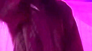 Smoking a Cigarette Outdoor While Wearing Only a Bikini and a Jacket