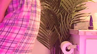 Emily pissing in the bathroom