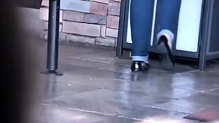 Crossed Ankle Blonde woman flats shoeplay POV