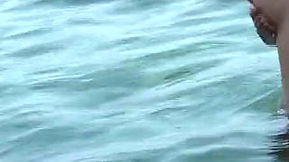 Blonde Babe Fingers Pussy on Rocky Beach to Orgasm