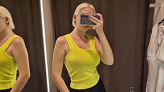Busty platinum-blonde Mycandyalice tries on sexy sheer outfits in the dressing room